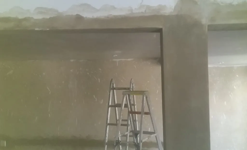 Interior wall plastering during home renovation