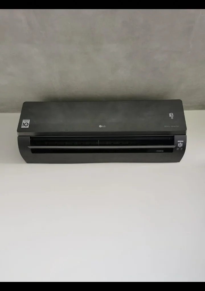 Dark wall-mounted air conditioning unit