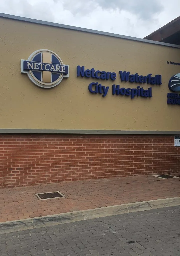 Business name signage mounted on a commercial building