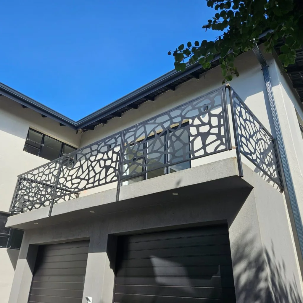 Decorative laser-cut steel balustrade on a residential balcony