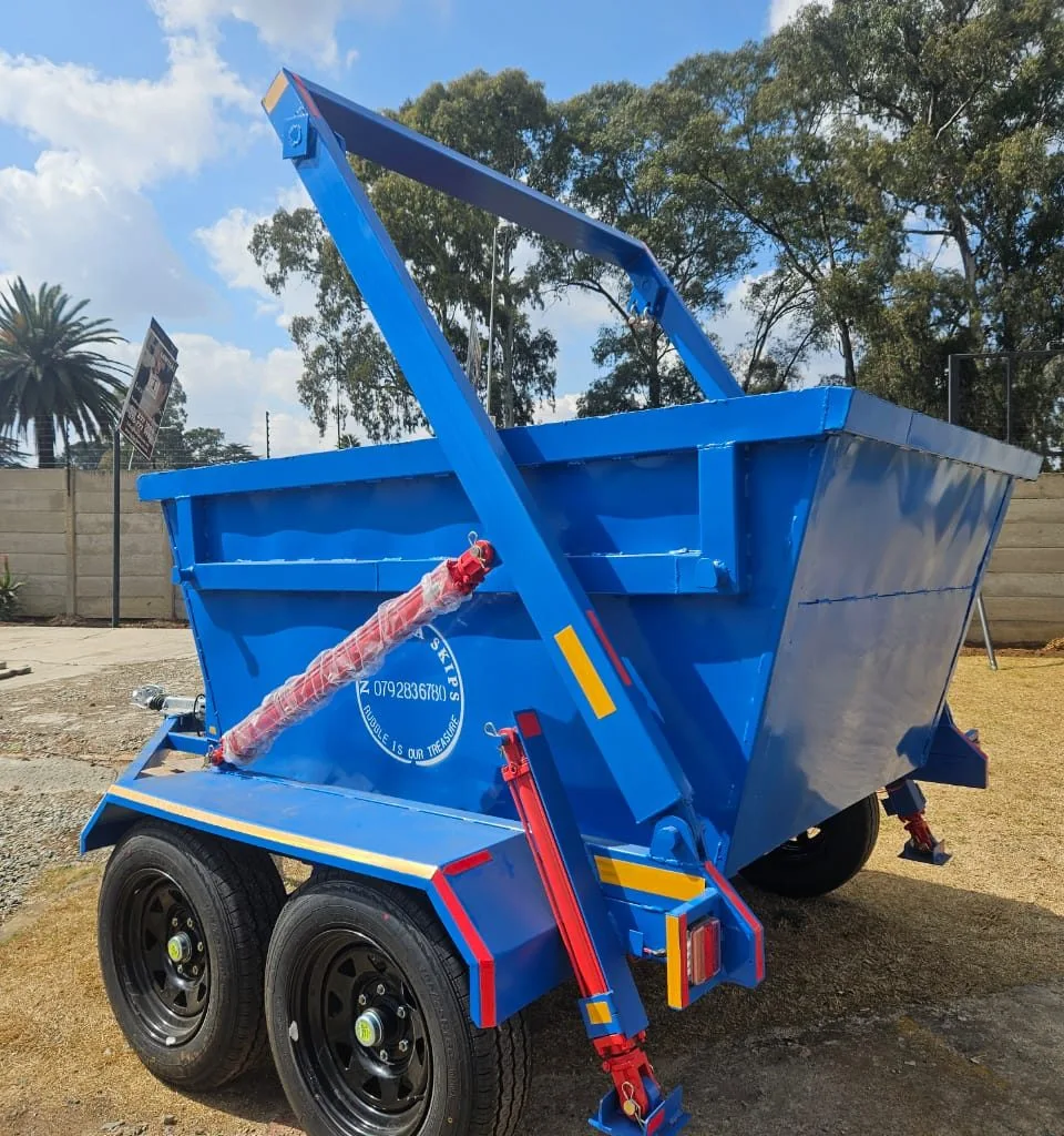 Blue steel skip bin trailer with raised loading frame