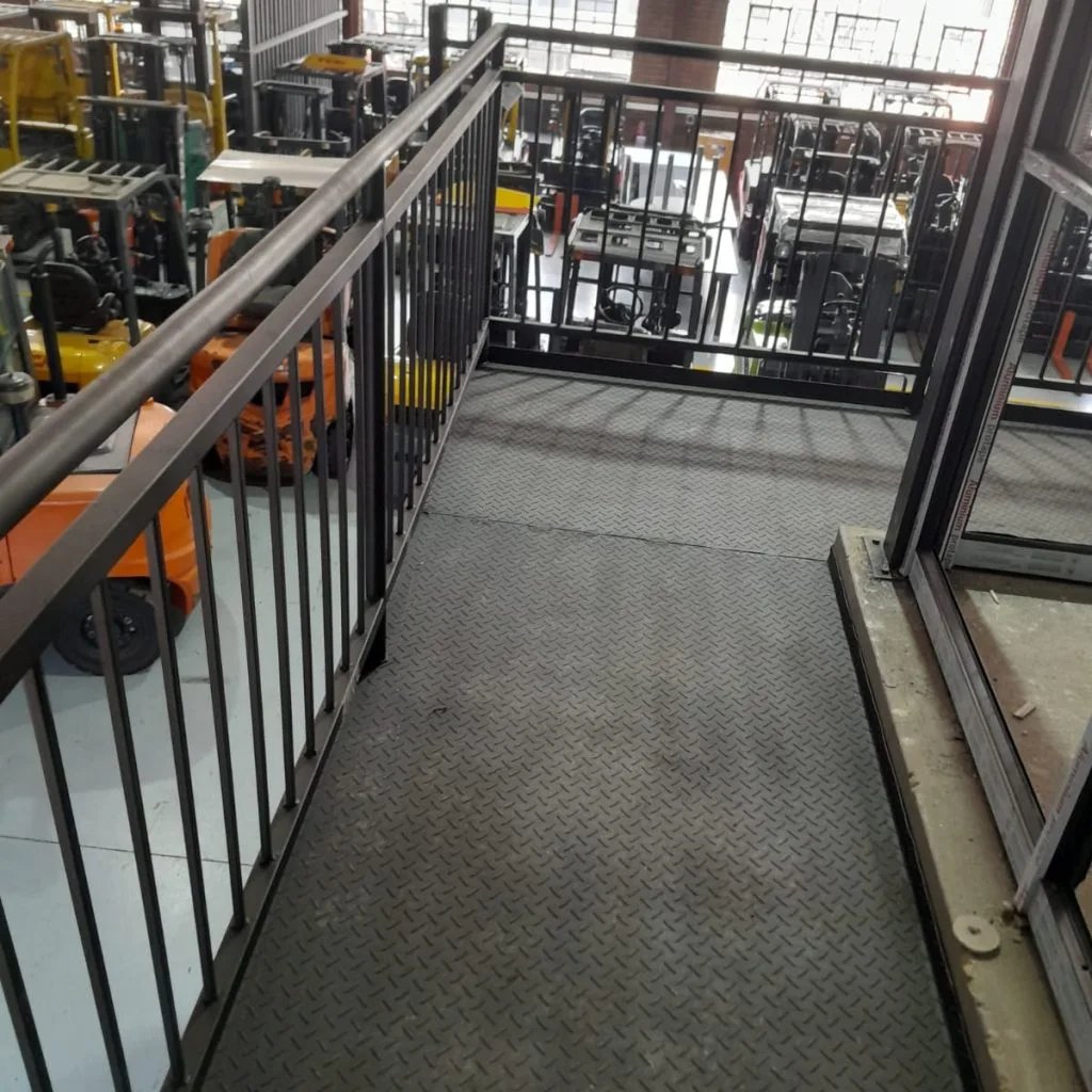 Mezzanine walkway with steel balustrades