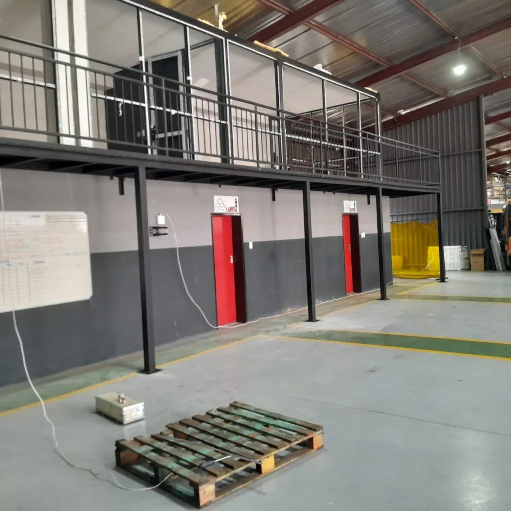 Warehouse mezzanine floor supported by steel columns