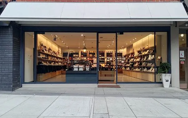 Glazed shopfront with display windows and entrance doors